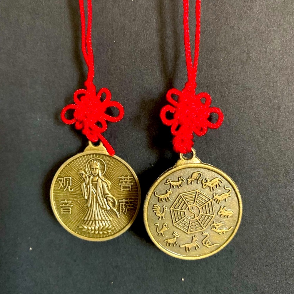 Kwan Yin and Chinese Zodiac Animal Coin on a Red Knot Lucky Charm.